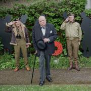 Winston Churchill in the museum garden, soldier displays from Standing with Giants