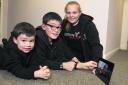 Watching the video online are, left to right, Joe Phipps, four, Harry Phipps, 12, and Orla Sprules, 12