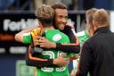 Lawrence Vigouroux celebrates Town’s win at Luton on Saturday with defender Dion Conroy