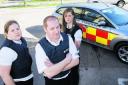 Doorstep crime team leader Martin Woodley, centre, with enforcement officers Philippa Green, left, and Natalie Hill