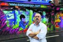 Clems owner Luis Carrera, above, has been told he must repaint the graffiti front of the nightclub to comply with conservation area regulations. Picture: OX62066 David Fleming