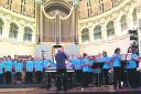 The Songscope choir on stage at Oxford Town Hall at a performance in September
