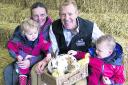 TV’s Adam Henson with visitors to his Cotswold Farm Park