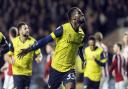 Chey Dunkley celebrates a goal for Oxford United