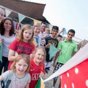 Decorating Dean Court Community Centre, are, back from left, Anna Pearson, Rachel Preece, Amy Leo, 11, Priscilla Waugh, Paul Hettler, Micah Hettler, 18 months, Jamel Miah and Jubel Miah, and, front, Holly Champ, seven, and Casey Champ, 10