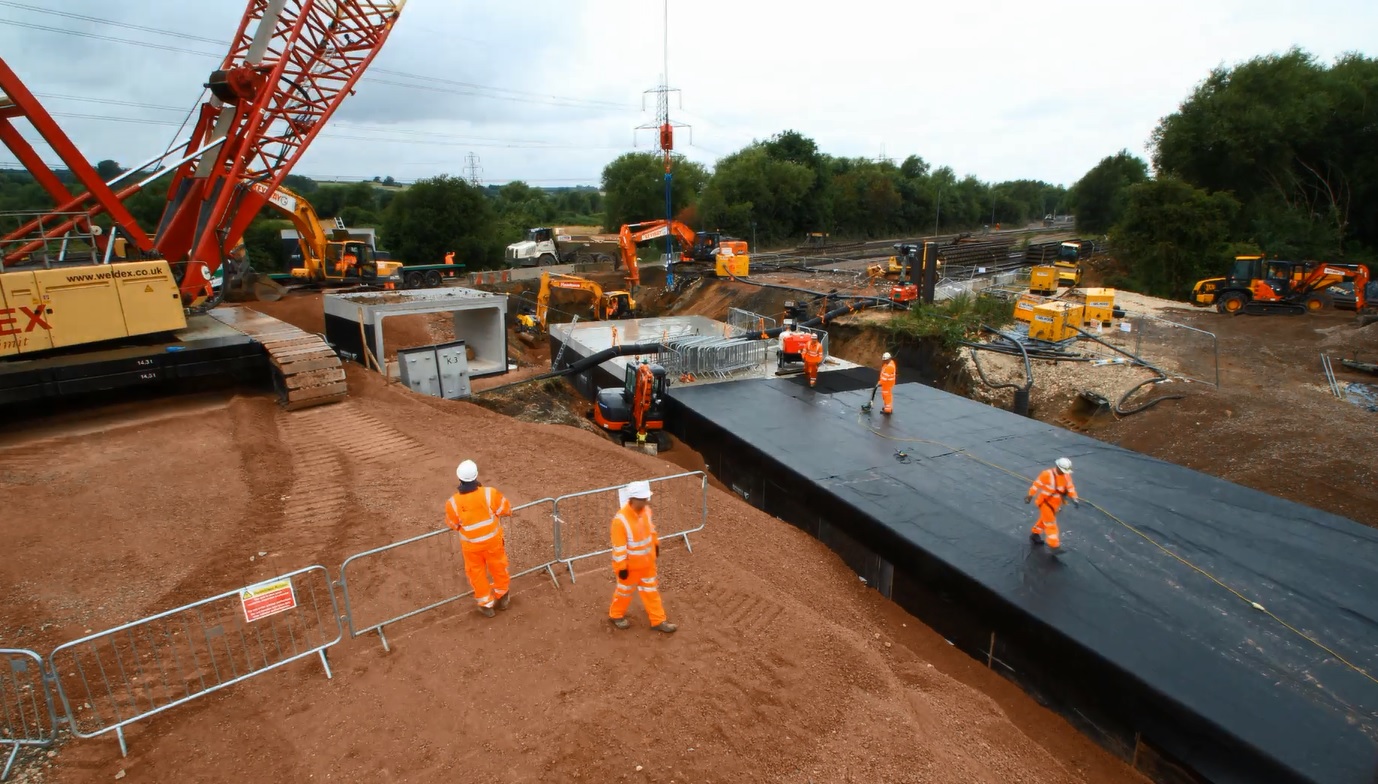 Time-lapse video reveals how 23-tonne flood channels were squeezed beneath the railway
