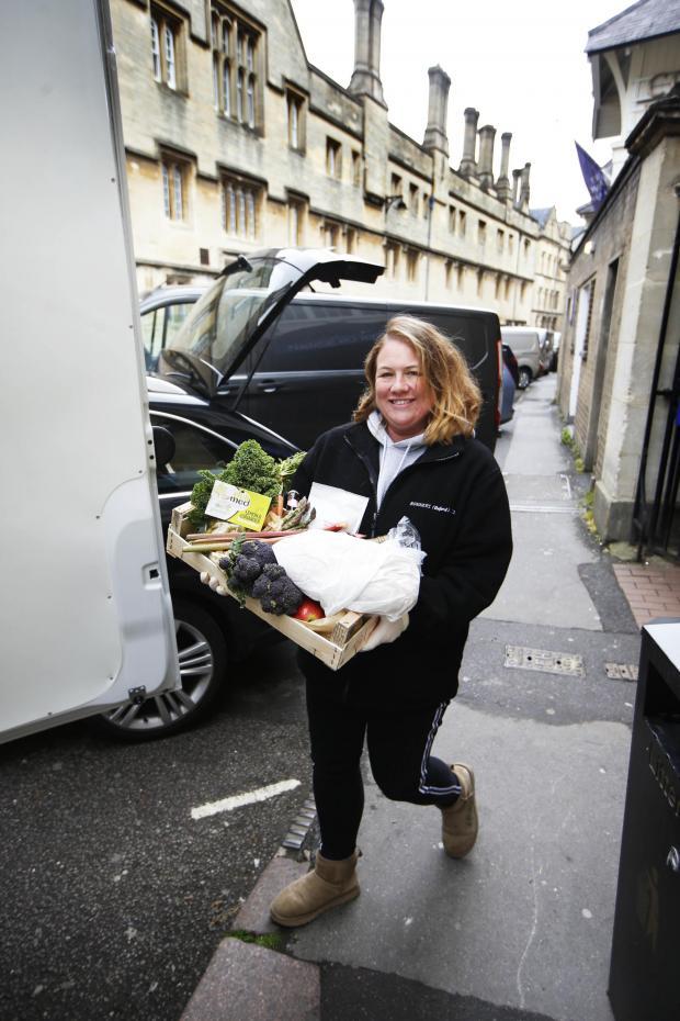 Verity Piggott of Bonners puts deliveries in a van