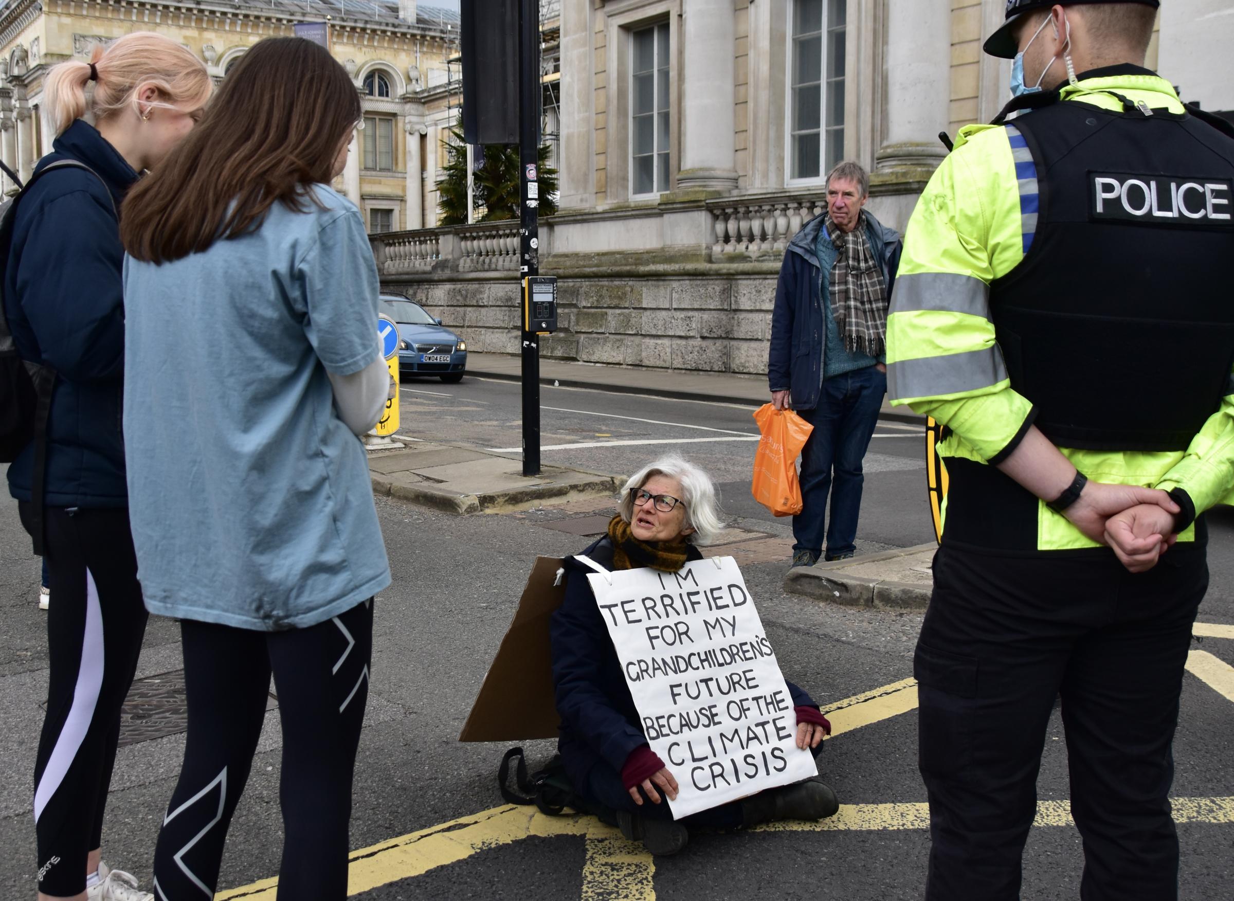Climate protestor sat in Broad Street, Oxford, on Saturday. Picture: Suzanne Williams