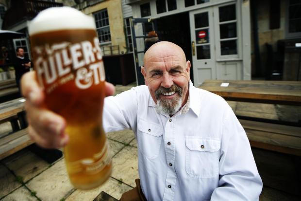 A drinker enjoys a pint at The Head of the River in 2020