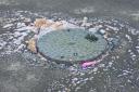 Overflowing manhole on Abingdon Road