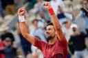 Novak Djokovic battled into the quarter-finals (Thibault Camus/AP)