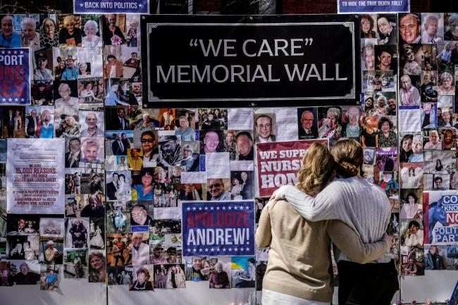 A protest-memorial wall for nursing home residents who died from Covid-19 in New York