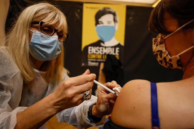 A woman receives a Pfizer Covid-19 vaccine in Strasbourg, eastern France