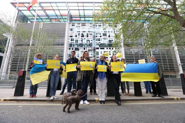A group of would-be hosts, sponsors and supporters of Ukrainian refugees, hold a Vigil for Visas outside the Home Office (PA)