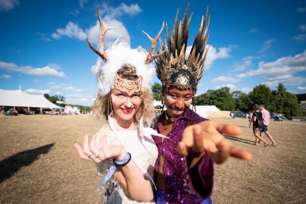 thisisoxfordshire: L-R: Holly Roxanne and Porscha Jean of the band Mamas getting in the mood for one of the UK's most extravagant music festivals in Cornbury Estate. Photo: Andrew Walmsley.