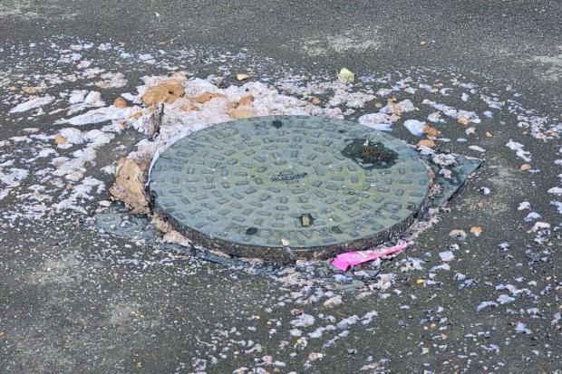 Overflowing manhole on Abingdon Road