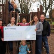 (Left to right) Cllr Ali Gordon Creed, Parish Councillor Helen Birks, Laura Purse of the fundraising committee, and Lee farmer, of Persimmon Homes with children who are eagerly awaiting the new play equipment